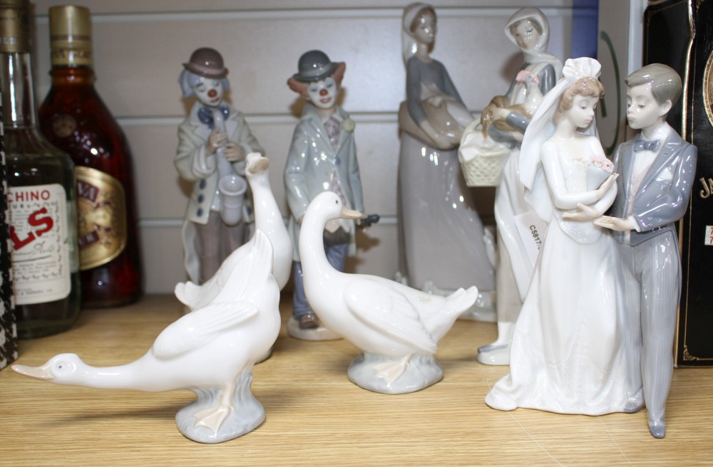 Five assorted Lladro figures and three Nao geese